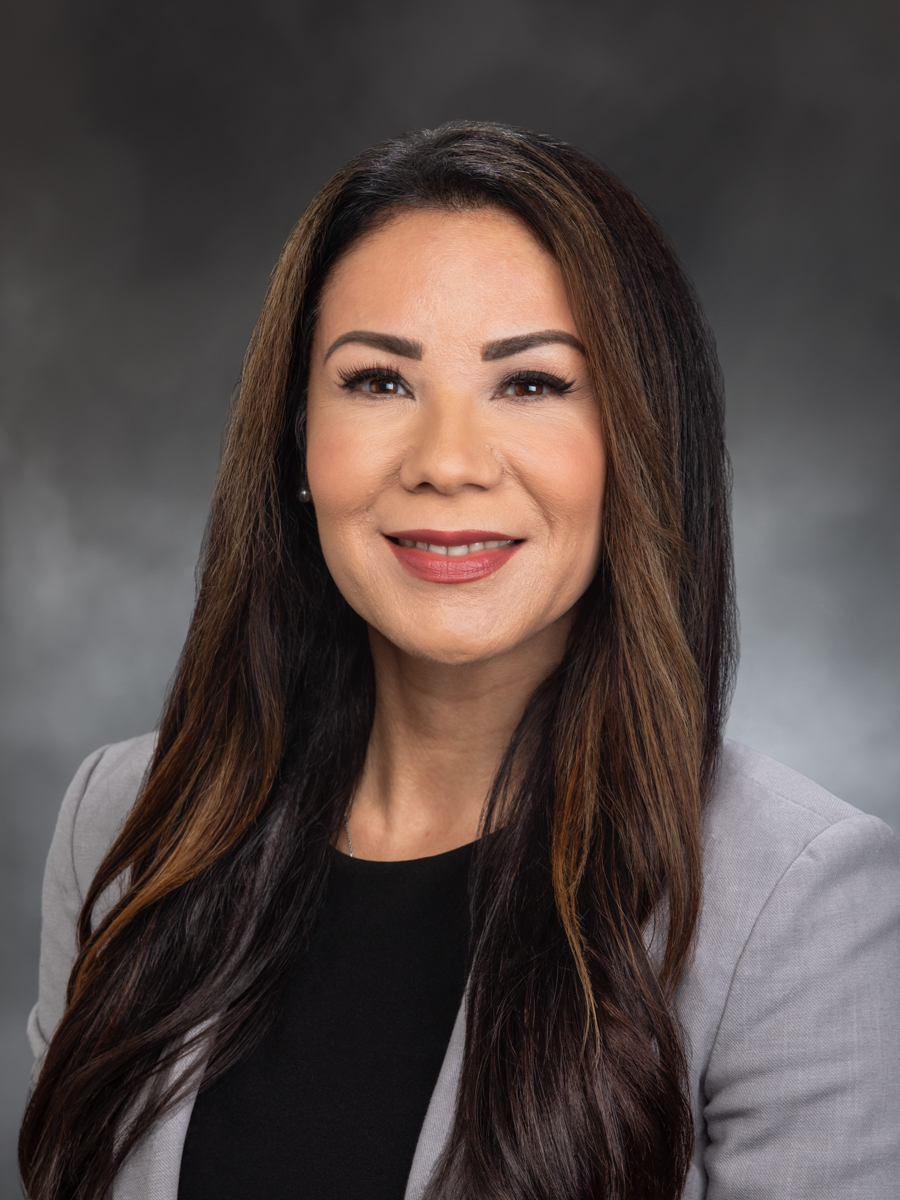 Nikki E. Torres